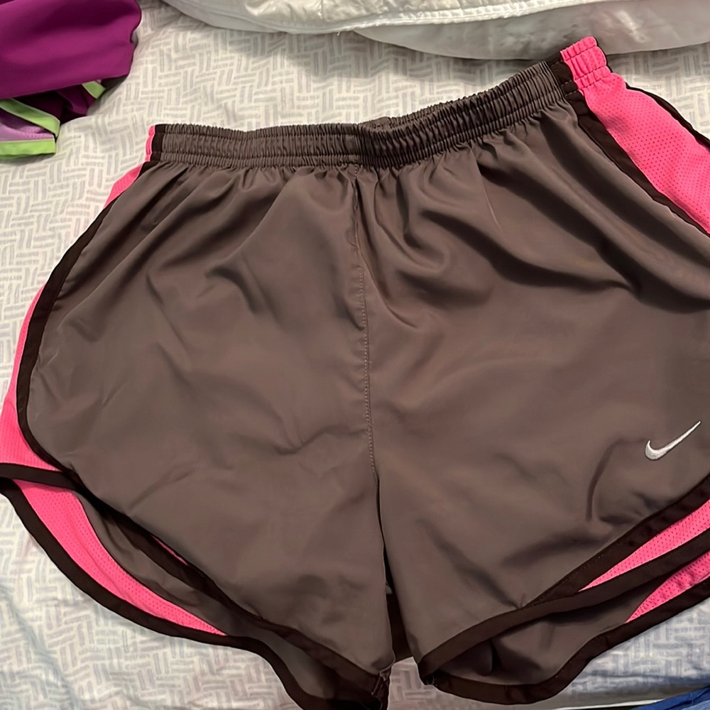 Brown and pink Nike shorts